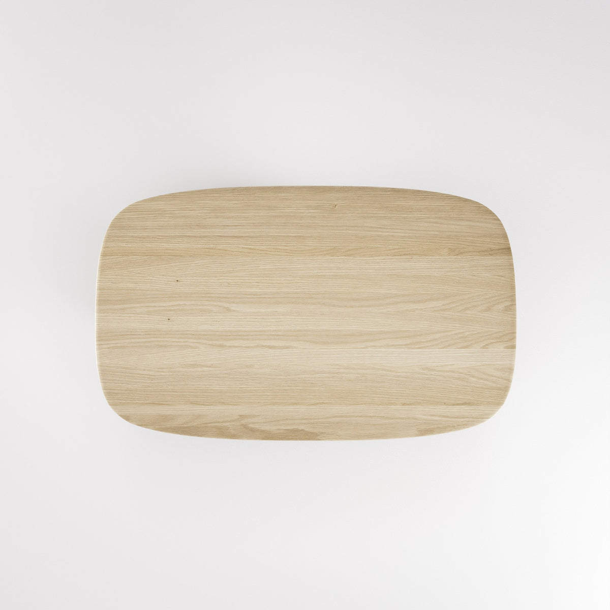 Plateau de la table à manger Amos en chêne naturel vu de dessus et ses angles arrondis
