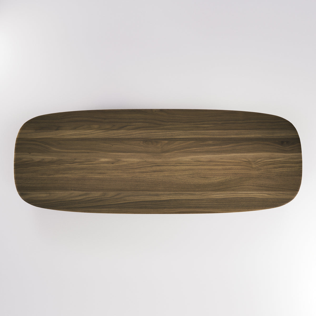 Plateau de la table à manger Amos Noyer foncé vu de dessus et ses angles arrondis