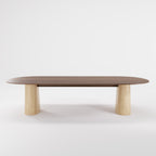 Table à manger Anchor 300 cm en noyer foncé vue de face sur ses deux socles en travertin