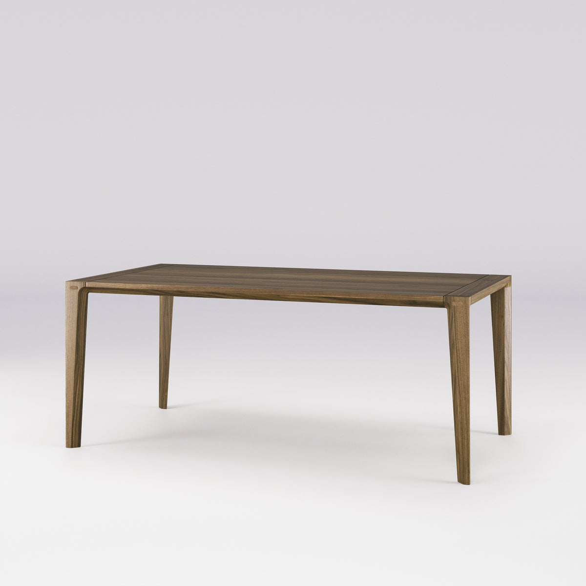 Table à manger Raia 180 cm en noyer foncé vue de trois quarts