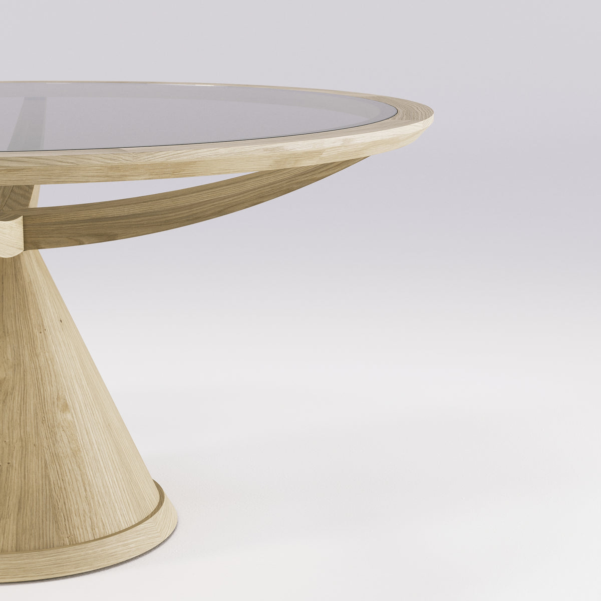 Bord du plateau de verre bronze posé dans son anneau de chêne naturel sur la table Vasco