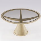 Table à manger ronde Vasco en chêne naturel vue de trois quarts avec son plateau de verre bronze