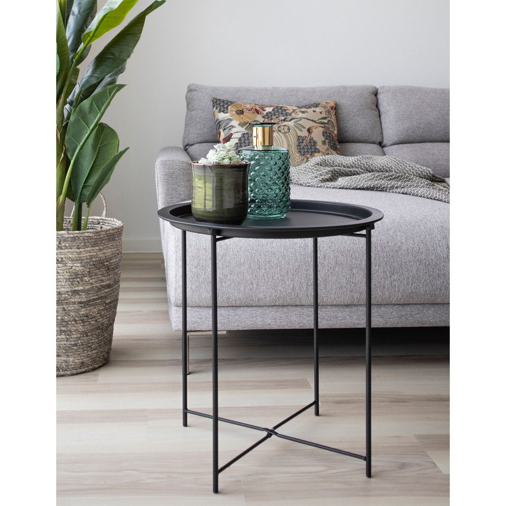 Table Bastia métal noir mat avec vase et bougie ambiance canapé salon gris clair