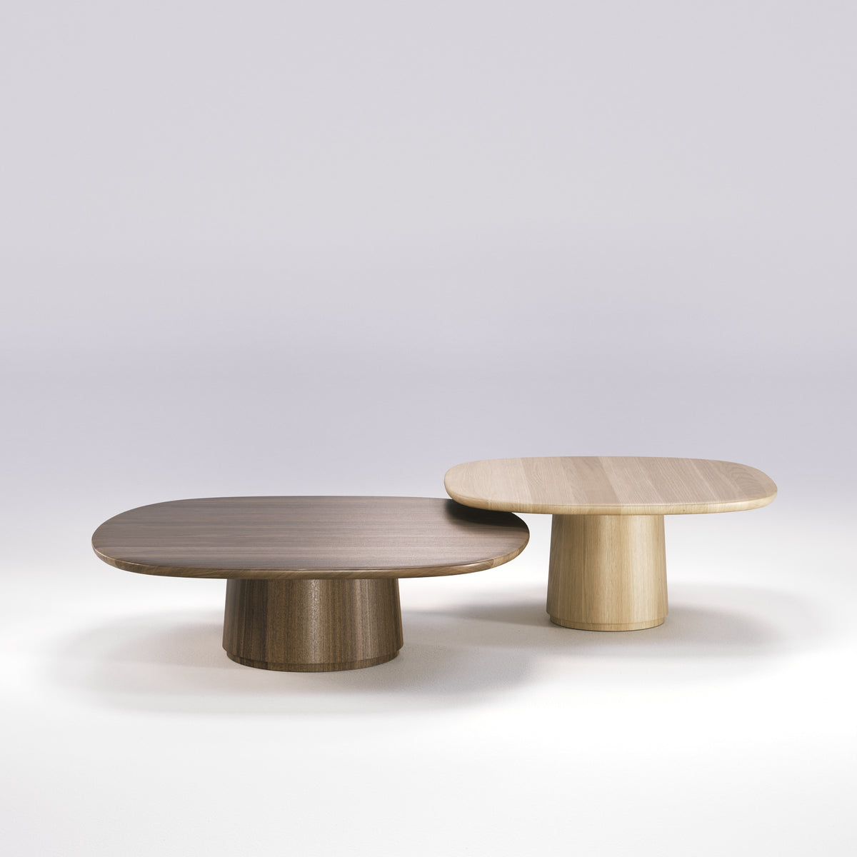 Table basse Amos de 100 cm en noyer foncé et table basse Amos de 80 cm en chêne naturel, l'une contre l'autre