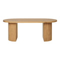 Table basse ovale Boavista chêne naturel colonnes cannelées vue de face 120 cm