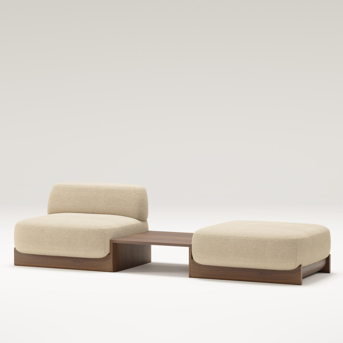 Table basse centrale Dome en noyer foncé entre une chauffeuse et un pouf Dome