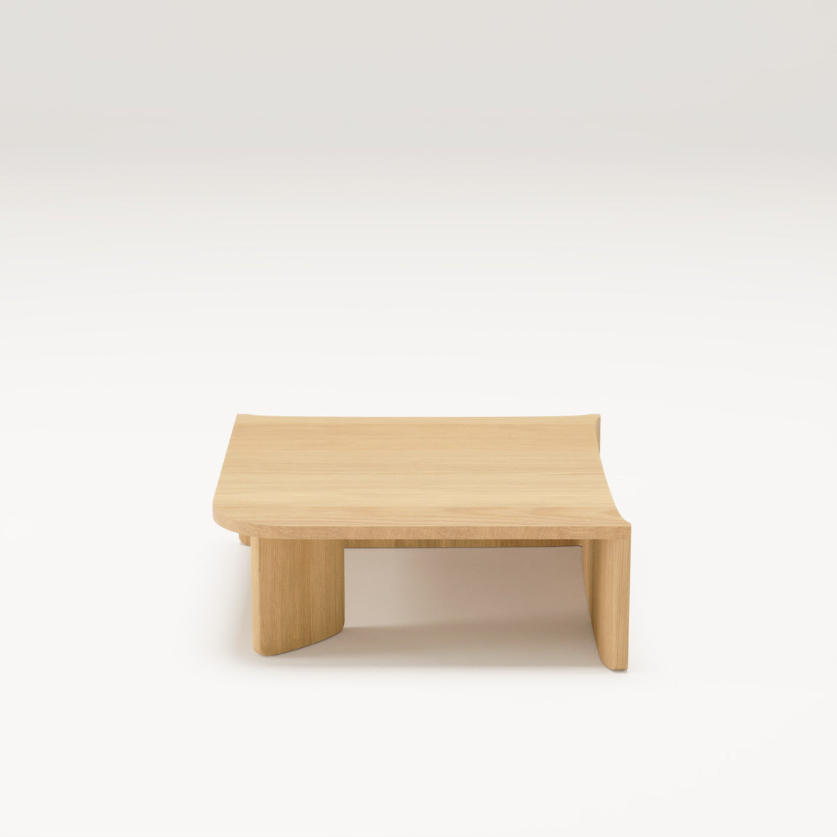 Table d'angle Dome en chêne naturel vue de face sur ses joues pleines