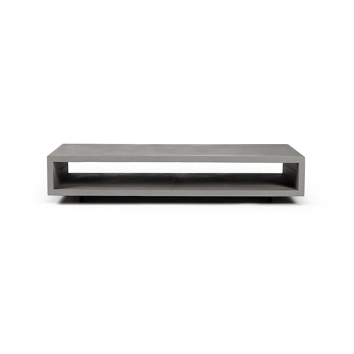 Table basse Monobloc en béton gris vue de face à hauteur de plateau