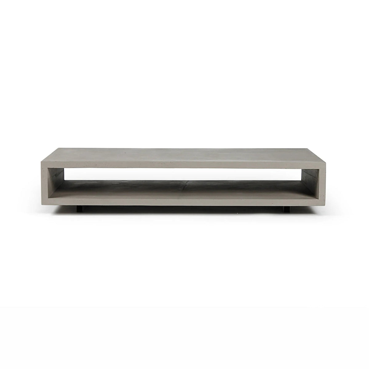 Table basse Monobloc en béton gris vue de face avec sa niche ouverte et ses patins