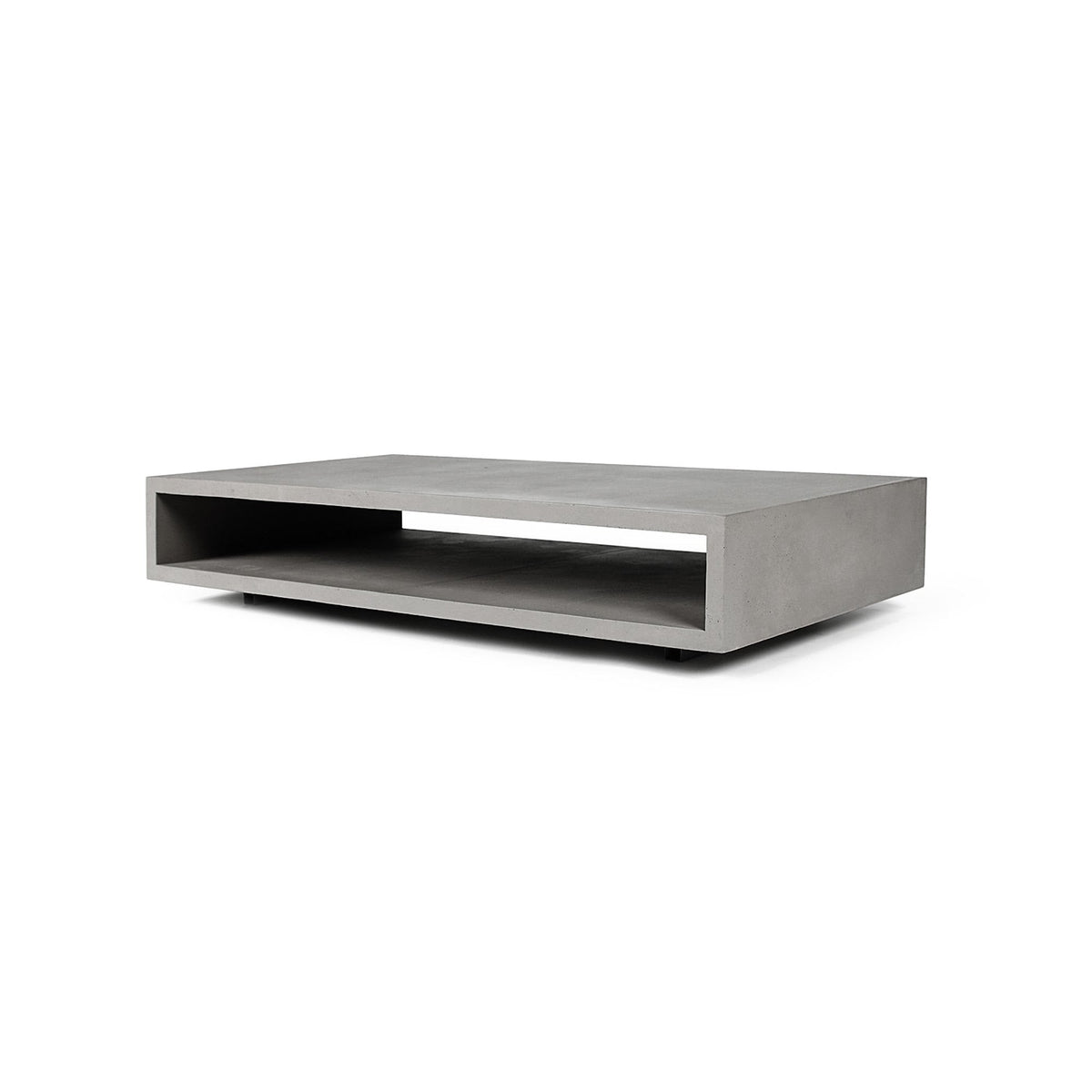 Table basse Monobloc en béton gris en perspective avec la niche visible sur toute sa longueur