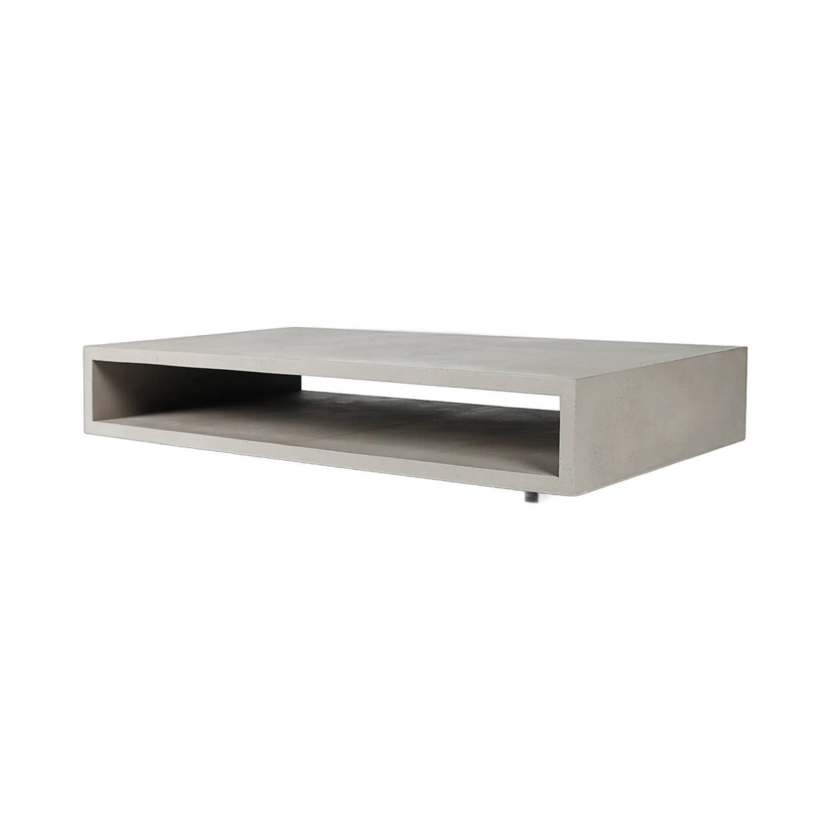 Table basse Monobloc en béton gris vue de trois quarts avec sa niche traversante