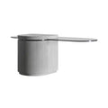 Table basse Strut oblongue avec son pied en béton cannelé et son plateau en verre teinté en forme de pilule