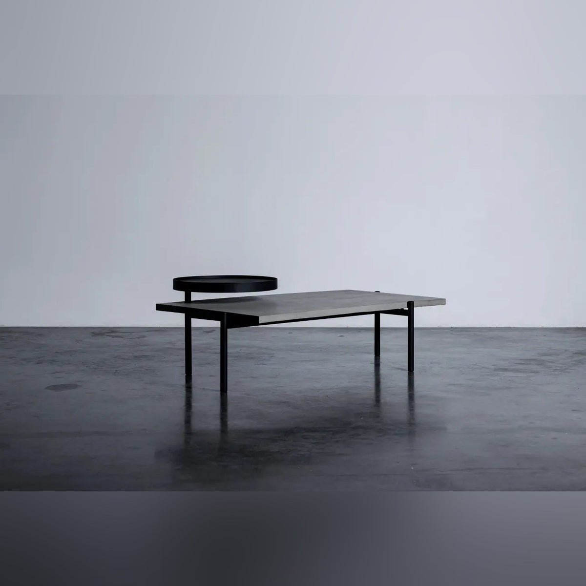 Table basse en béton Twist noir en situation 4