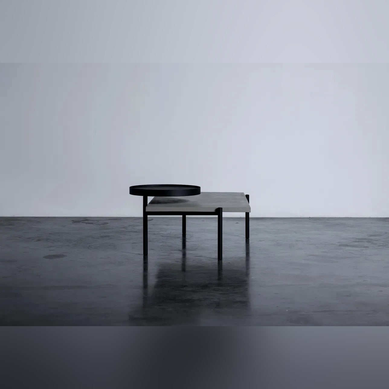 Table basse en béton Twist noir en situation 5