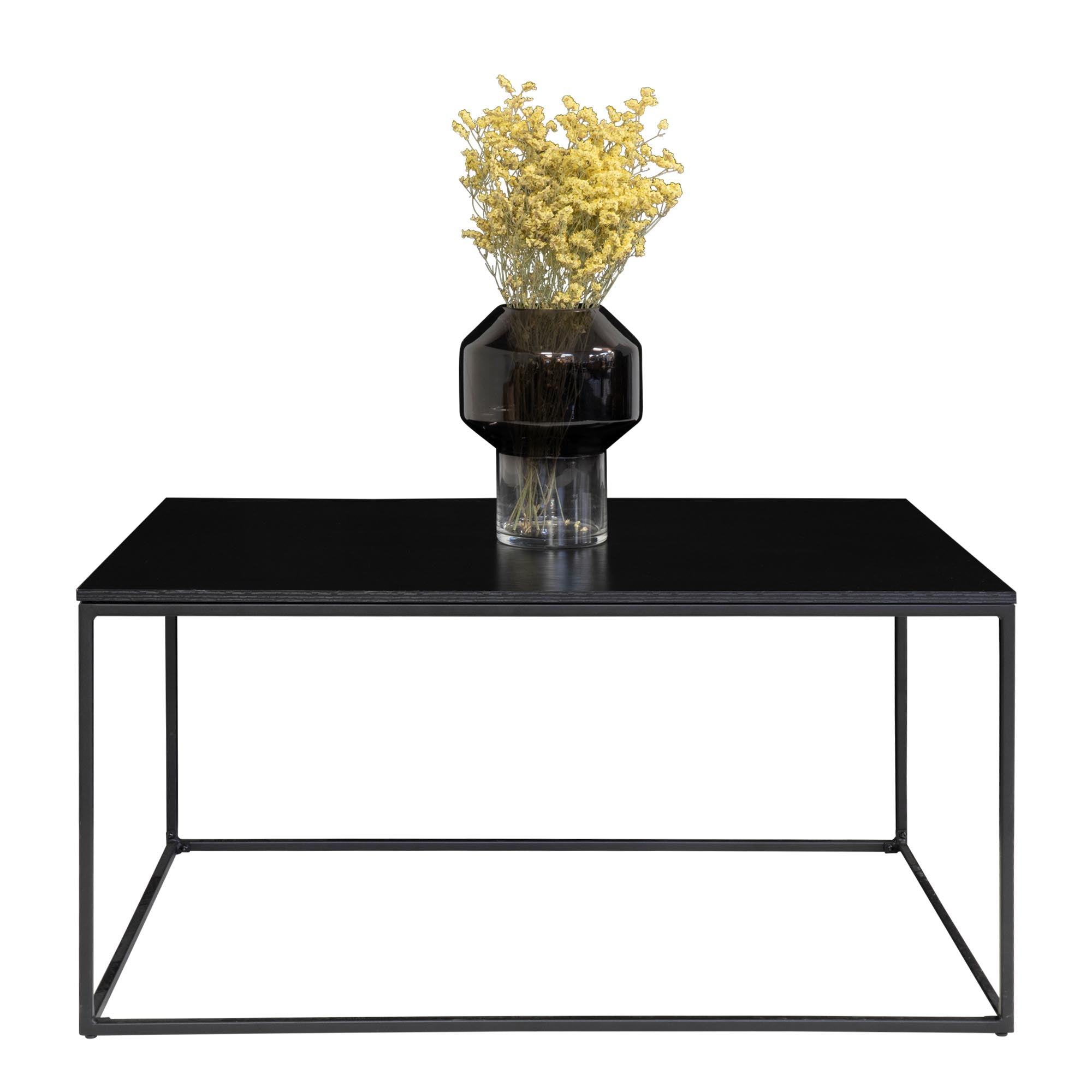 Table basse Vita noire vue de face avec vase verre fumé et fleurs séchées jaunes