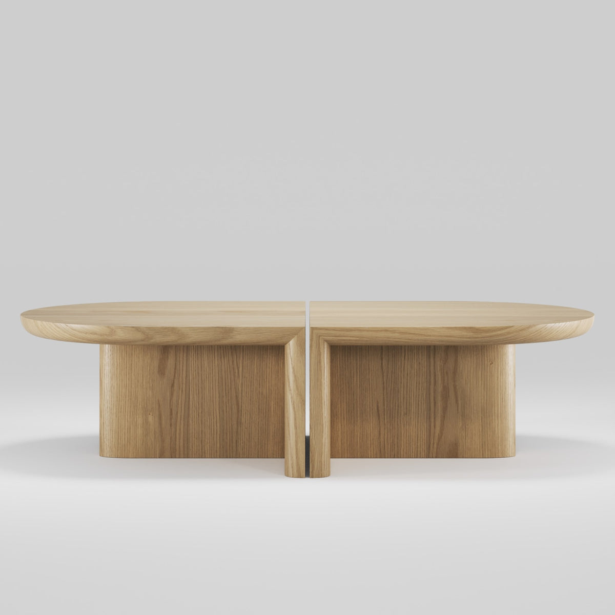 Deux tables basses Re-Form en chêne naturel dos à dos formant un ovale