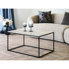 Table basse Vita plateau travertin beige pieds métal noir 90x60 cm ambiance salon