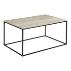 Table basse Vita travertin beige châssis acier noir vue trois quarts fond blanc