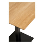 Détail angle plateau mélaminé chêne naturel table Fano pied métal noir mat