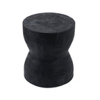 Tabouret diabolo Kotoran en bois de suar noir vu de trois quarts avec les cernes du bois sur l'assise