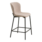 Tabouret Maceda bouclé beige vue trois quarts profil silhouette enveloppante structure acier noir