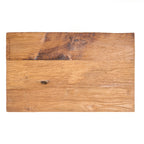 Plateau du tabouret Siku en teck recyclé vu de dessus avec ses planches ses nuances et un nœud du bois