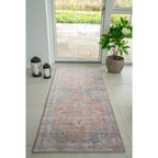 Tapis Havana orange bleu ambiance entrée baie vitrée carrelage beige lanterne