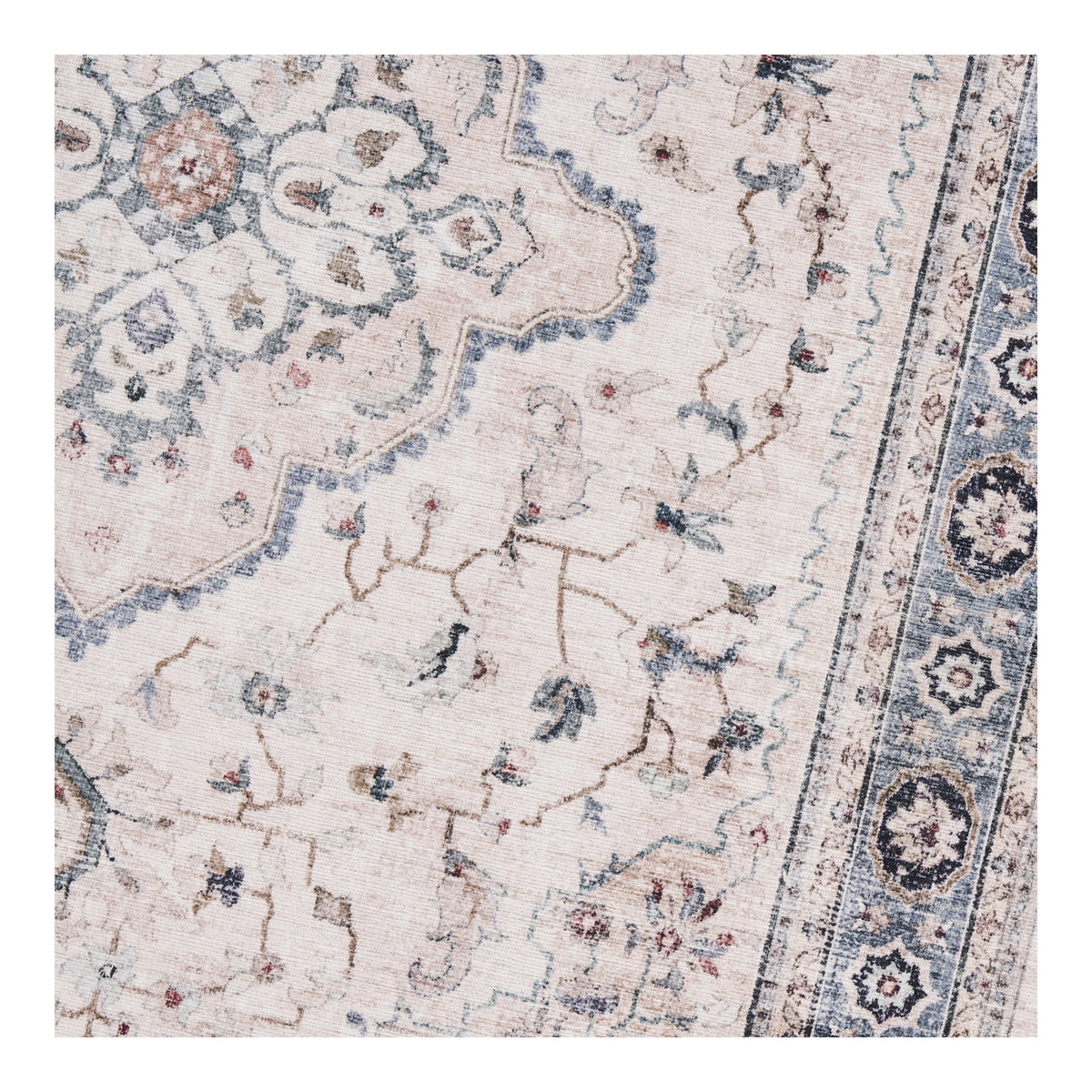 Détail du tapis Havana beige 80 x 200 cm sur le médaillon les fleurs et la bordure bleu poudré
