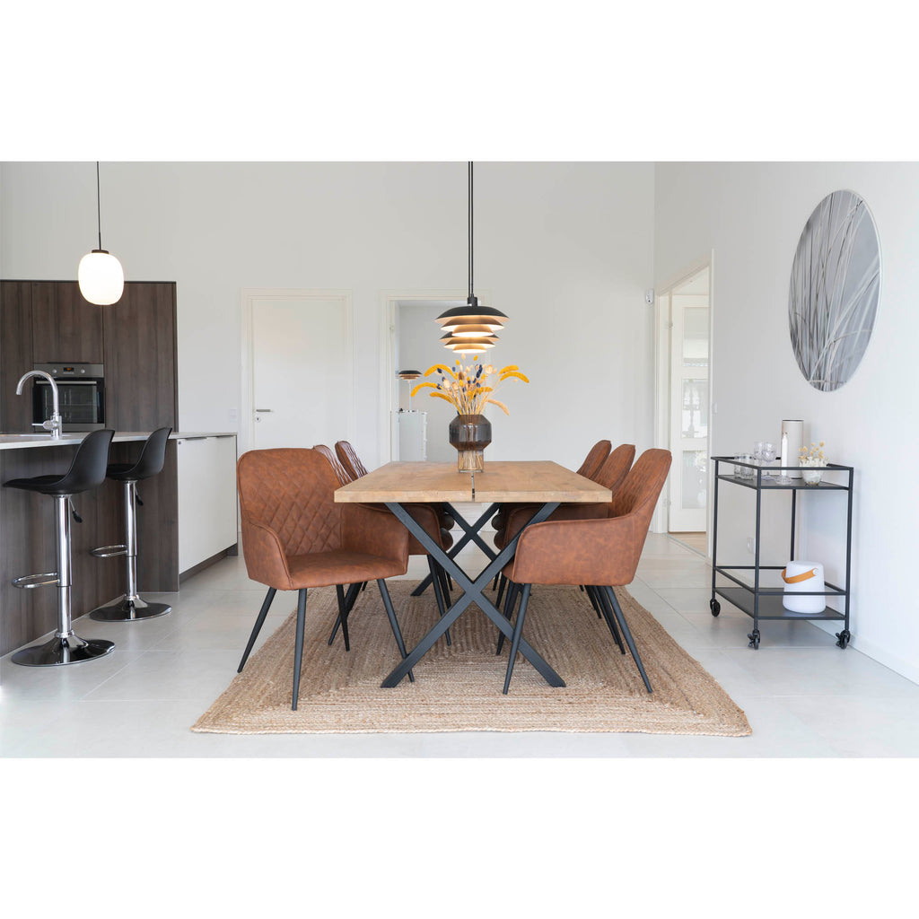 Tapis Bombay jute naturel salle à manger table bois chaises cuir marron sol blanc