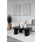 Tapis Pune ivoire ambiance salon table basse noire canapé gris cheminée