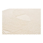 Tapis Pune laine ivoire détail motif relief arcs concentriques touffetage main
