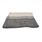 Torchon Moody plié côté bandeau noir chiné