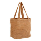 Tote bag Parade vu de trois quarts la maille ajourée et le fond plat du cabas en paille de papier