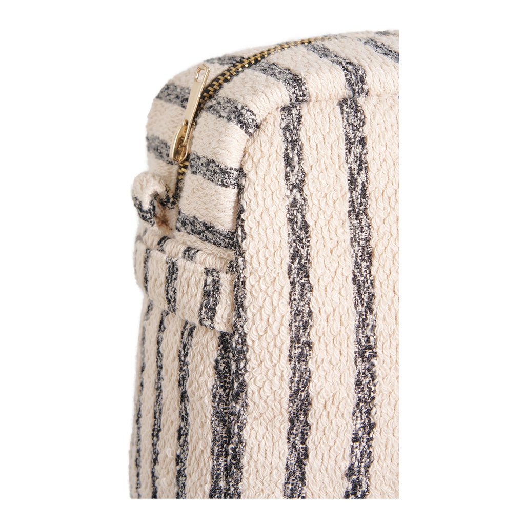 Trousse Nador bouclette crème rayures noires détail fermeture zip dorée gros plan